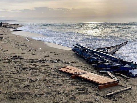 A view of  part of the wreckage of a capsized boat that was washed ashore at a beach near Cutro, southern Italy, Monday, Feb. 27, 2023.