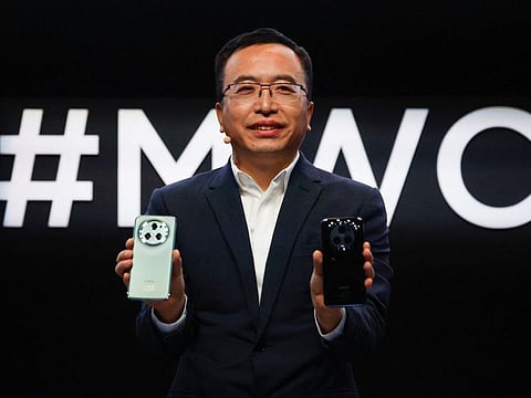 George Zhao, CEO of Honor Device, presents a new product, Honor Magic5 Pro, at the 2023 Mobile World Congress.