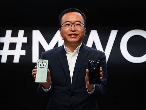 George Zhao, CEO of Honor Device, presents a new product, Honor Magic5 Pro, at the 2023 Mobile World Congress.