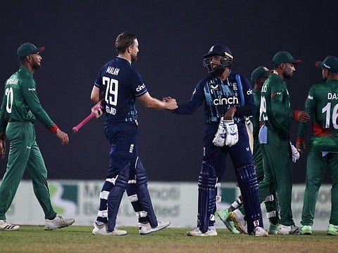 England's Dawid Malan and Adil Rashid celebrate after beating Bangladesh in the first ODI at the Sher-e-Bangla National Cricket Stadium, Dhaka, Bangladesh.