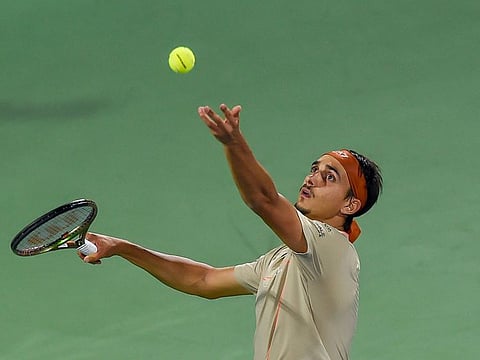 Lorenzo Sonego of Italy in action against Felix Auger-Aliassime of Canada in the ATP Dubai Duty Free Tennis Championships on March 1, 2023. Sonego beat the fourth seed to enter the quarterfinals.