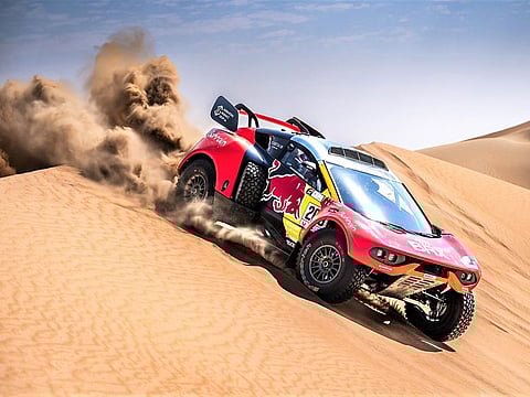 Sebastien Loeb will battle Nasser Al Attiyah all the way in the World Rally-Raid Championship.