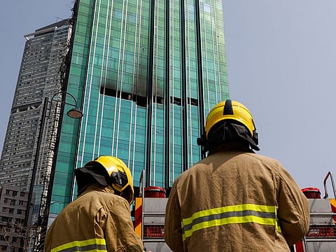 An under-construction skyscraper is seen after a blaze is put out at Tsim Sha Tsui in Hong Kong.