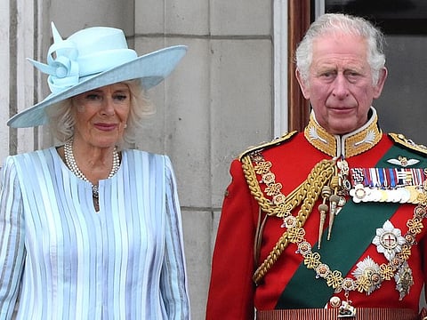 Britain's Camilla, Duchess of Cornwall and Britain's Prince Charles, Prince of Wales, watch a special flypast from Buckingham Palace balcony following the Queen's Birthday Parade, the Trooping the Colour, as part of Queen Elizabeth II's platinum jubilee celebrations, in London. - Buckingham Palace announced on March 3, 2023, that King Charles III's first state visit to France will start on March 26.  