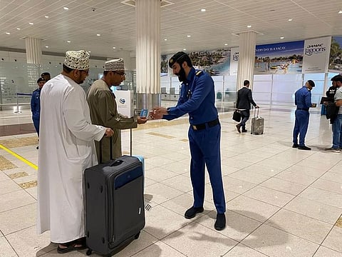 Arrivals at Dubai International Airport receive gifts from Dubai Customs officials that carry an identification code to allow them to participate in the ideas' survey