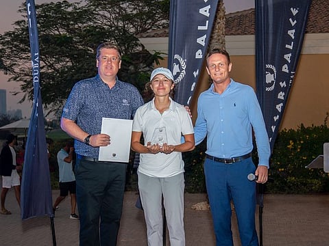 Lara El Chaib (Abu Dhabi Golf Club) in the centre, winner of The Els Club Ladies' Open, alongside GM Tom Rourke (left) and Operations Manager Tom Nicholason (right)