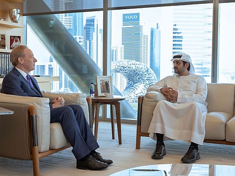 Sheikh Maktoum bin Mohammed bin Rashid Al Maktoum, Deputy Ruler of Dubai, Deputy Prime Minister and Minister of Finance of the UAE [R] with Microsoft’s Vice Chair and President Brad Smith