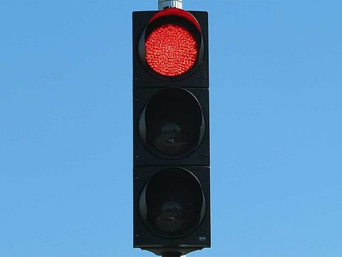 Jumping a red signal is extremely dangerous. For illustrative purposes only.