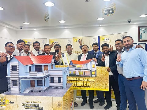 Mir K Rasool, CBO of Index Exchange with winner Raja Zahid Ul Hassan (in the centre)