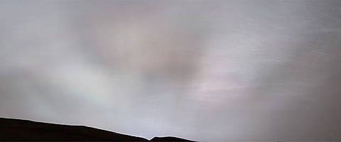 The Curiosity rover captured these 'sun rays' shining through clouds at sunset on February 2, 2023. 