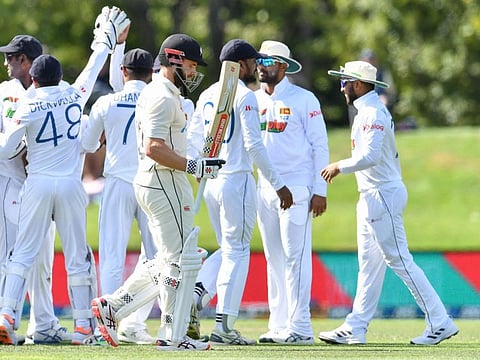 Sri Lankan players celebrate the dismissal of New Zealand's Kane Williamson during the second day of the first Test at Hagley Oval in Christchurch on Friday.
