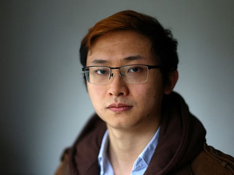 Junior Doctor Poh Wang, 28, poses for a photograph at his home in London, Britain, March 8, 2023.  