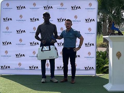 Jonathan Selvaraj (left), winner of the Saadiyat Beach Golf Club Men's Open alongside Julian Danby, representing VIYA Golf
