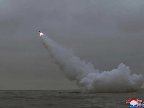 This photo provided by the North Korean government shows what it says is a cruise missile the country test-fired from a submarine off the east coast of North Korea early Sunday, March 12, 2023. 