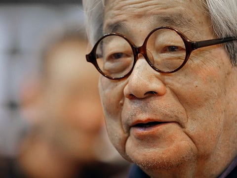 Japanese Nobel Prize winning author Kenzaburo Oe poses during the inauguration of the 32nd Paris Book Fair, which focused on Japanese writers, March 15, 2012.