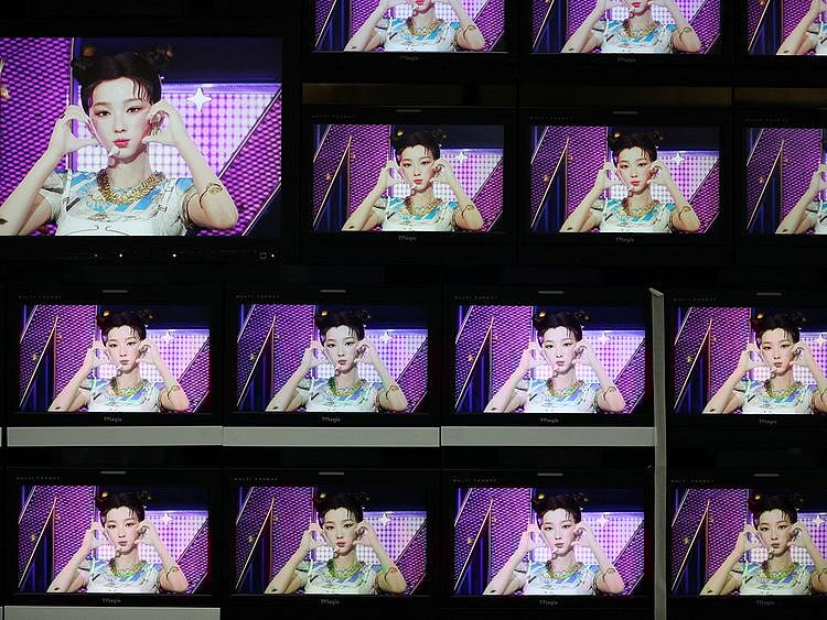 Footages of virtual girl group MAVE: is played at the control room of MBC in Seoul