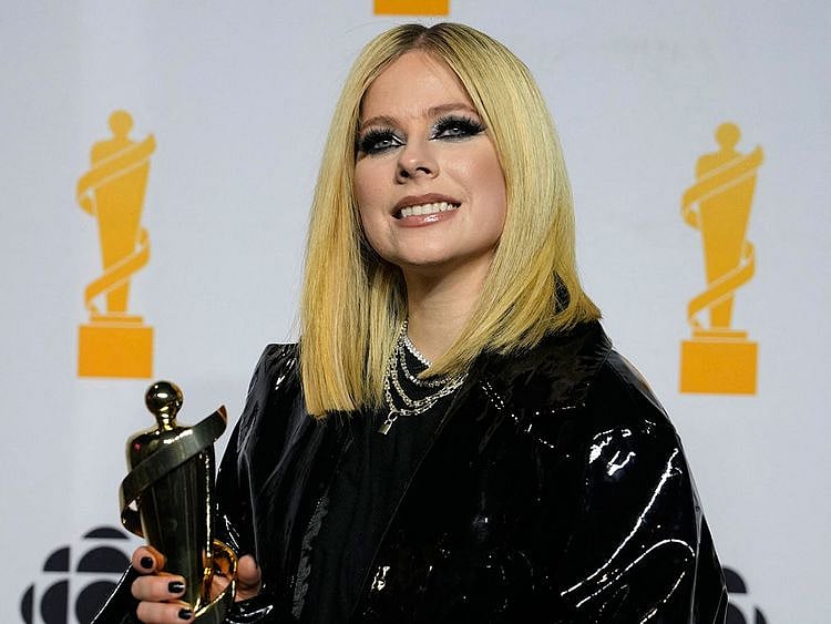 Avril Lavigne poses backstage with her award for TikTok Juno Fan Choice as the Canadian Academy of Recording Arts and Sciences (CARAS) presents its 52nd annual Juno Awards in Edmonton, Alberta, Canada March 13, 2023.