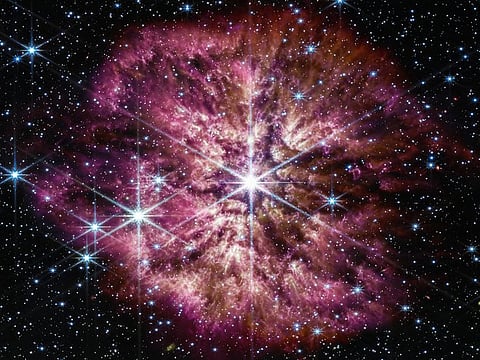 The star 'Wolf-Rayet 124' captured by the James Webb Space Telescope. A surrounding nebula is made of material cast off from the aging star in random ejections, and from dust produced in the ensuing turbulence. The telescope captured the rare and fleeting phase of the star on the cusp of death. 