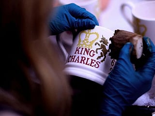 Charles' mugs and plates: Workers busy making pottery fit for a new king 