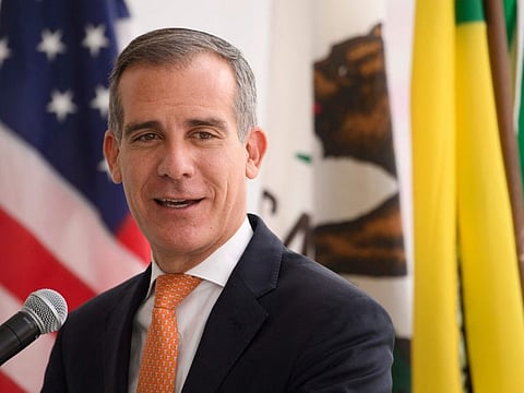In this file photo taken on June 4, 2021 Los Angeles Mayor Eric Garcetti speaks during the opening of the Terminal 1 expansion at Los Angeles International Airport (LAX) in Los Angeles, California.