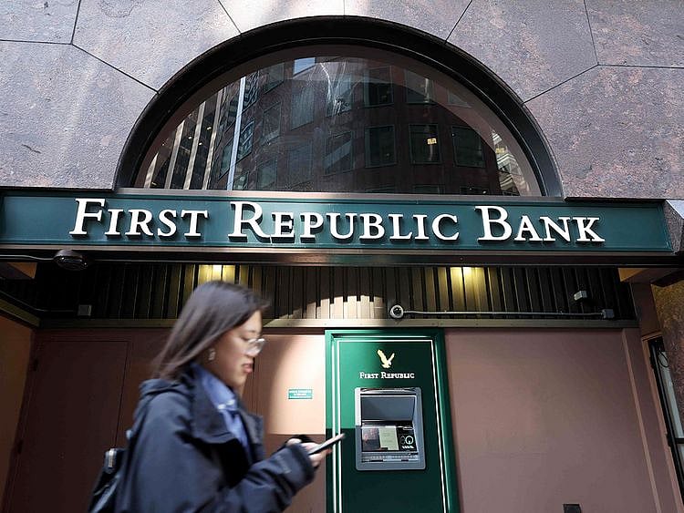 A pedestrian walks by a First Republic Bank office on in San Francisco, California. 