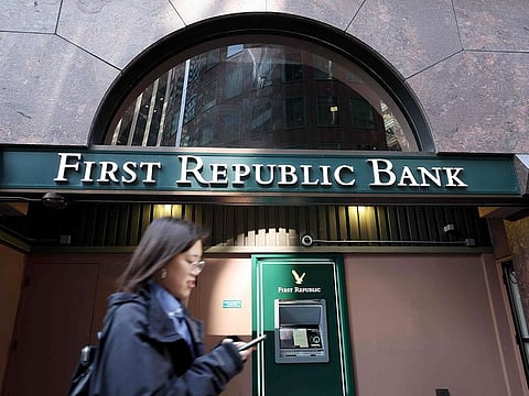 A pedestrian walks by a First Republic Bank office in San Francisco, California. 
