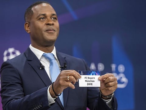 Former Duch player Patrick Kluivert picks FC Bayern Munich during the draw for the UEFA Champions League quarter-finals in Nyon on Friday.