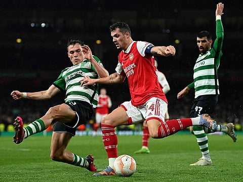 Sporting's Jakub Kiwior (left) vies with Arsenal's Granit Xhaka during the Uefa Europa League round of 16 second-leg on Thursday.