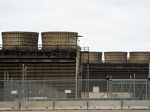 File photo: Cooling towers release heat generated by boiling water reactors at Xcel Energy's Nuclear Generating Plant, in Monticello, Minnesota. 