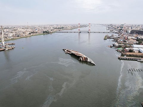 An aerial view of the 'Al Mansur' yacht, once belonging to former Iraqi President Saddam Hussein, which has been lying on the water bed for years in the Shatt Al Arab waterway, in Basra, Iraq. 