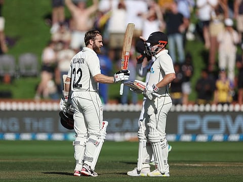 New Zealand's Kane Williamson (left) celebrates 200 runs with teammate Henry Nicholls on day two of the second Test against Sri Lanka at the Basin Reserve in Wellington.