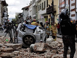 Photos: Buildings damaged, cars crushed as powerful earthquake strikes Peru, Ecuador