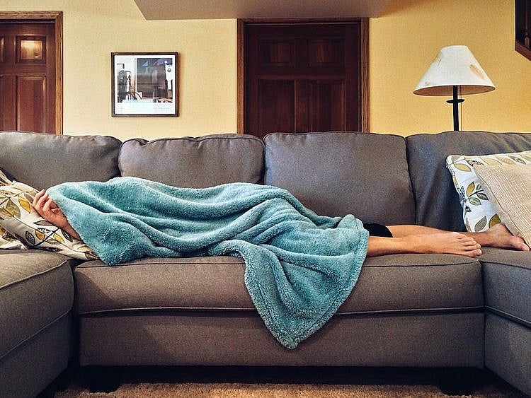Someone sleeping on the sofa from Pexels.com
