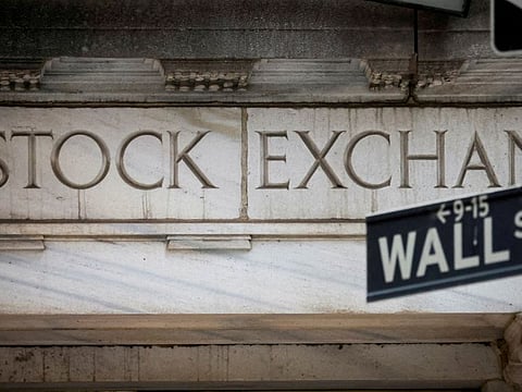 FILE PHOTO: The Wall Street entrance to the New York Stock Exchange (NYSE) is seen in New York City, U.S., November 15, 2022. REUTERS/Brendan McDermid/File Photo
