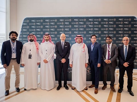 Walid Gomaa, CEO of Omnix International, and Engineer AbdulNasser bin Saif Al-AbdelLatif, Secretary General of Saudi Council of Engineers with the Omnix and SEC teams