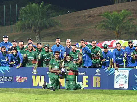 Bangladesh's players celebrate with the trophy after winning the ODI series against Ireland on Thursday.
