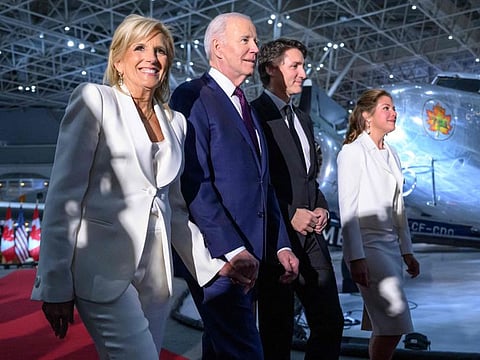 US President Joe Biden, First Lady Jill Biden, Canada's Prime Minister Justin Trudeau and his wife Sophie Gregoire Trudeau arrive to attend a gala dinner at the Canadian Aviation and Space Museum in Ottawa, Canada, on March 24, 2023.  