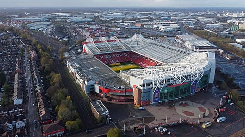 An aerial view shows Old Trafford stadium, home ground of to Manchester United in Manchester, northern England. The battle to buy United heated up as Qatari banker Sheikh Jassim Bin Hamad Al Thani and British billionaire Jim Ratcliffe prepared to raise their initial bids for the 20-time English champions after the submission deadline was extended.