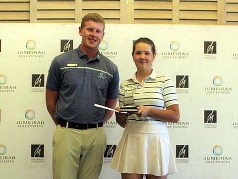 Winner of the 2023 Jumeirah Golf Estates Junior Open Martha Silchenko (JGE) with Rory Stewart, JGE Golf Experience Executive