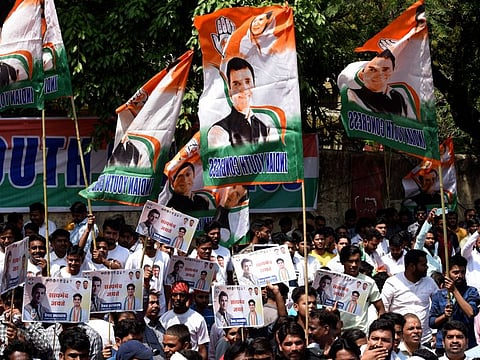 Supporters of opposition Congress party shout slogans as they protest against their leader Rahul Gandhi's expulsion from Parliament in New Delhi, India, Monday, March 27, 2023.