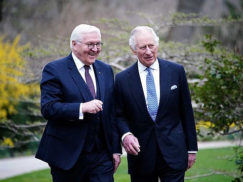 King Charles III and German President Frank-Walter Steinmeier walk after planting a tree following a Green Energy reception at Bellevue Palace, Berlin, the official residence of the President of Germany, during his State Visit to Germany, Wednesday March 29, 2023. 