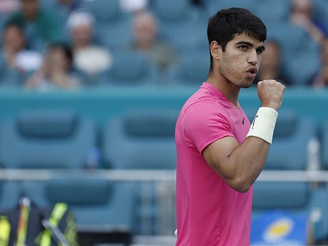 Carlos Alcaraz reacts after beating Tommy Paul on day nine of the Miami Open at Hard Rock Stadium.