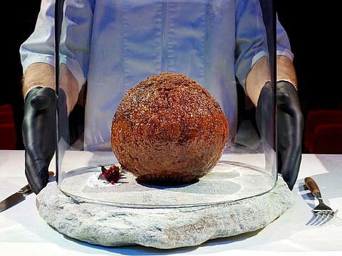 A meatball made from flesh cultivated using the DNA of an extinct woolly mammoth is presented at NEMO Science Museum created by a cultured meat company, in Amsterdam, Netherlands March 28, 2023. 