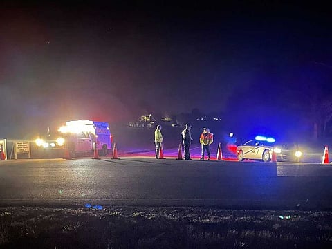 Emergency responders are seen near a site where two military helicopters crashed Wednesday night during a routine training mission in Trigg County, in southwestern Kentucky, on March 30, 2023. 
