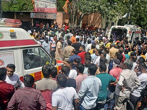 Devotees injured during the stepwell collapse at a Beleshwar Jhulelal Mahadev temple being taken to the hospital, at Patel Nagar area, in Indore on Thursday, Mar 30, 2023. 