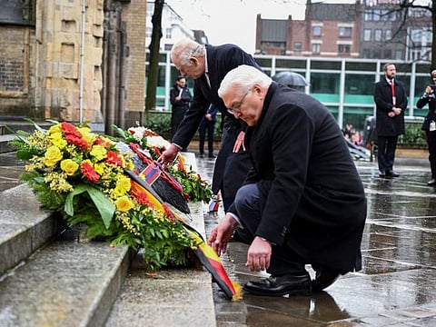 Britain's King Charles and German President Frank-Walter Steinmeier lay wreaths at St. Nikolai church memorial dedicated to the victims of allied bombings during World War Two in Hamburg, Germany, March 31, 2023.  
