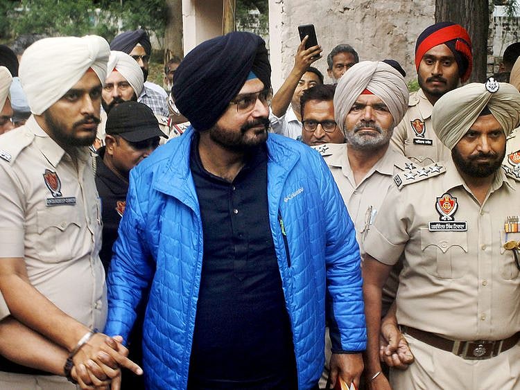 Congress leader Navjot Singh Sidhu comes out of the Patiala Central Jail after serving his one-year sentence in a 1988 road rage case (released 2 months early), in Patiala on Saturday.