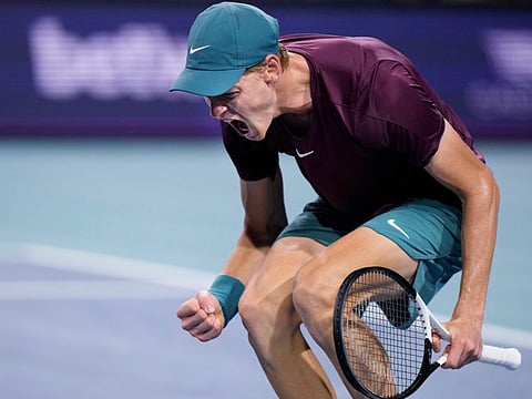 Jannik Sinner, of Italy, celebrates after beating Carlos Alcaraz, of Spain, during the Miami Open tennis tournament, in Miami Gardens. 