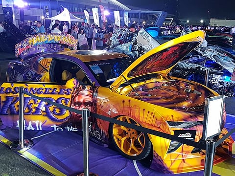 Customised cars, such as this Chevrolet Camaro, were the stars of the show at the second edition of the Kandura Rally at the Dubai Autodrome. 