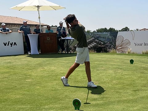 Second round co-leader Sam Mullane (JGE) in action on the first tee of the Fire course in round two at Jumeirah Golf Estates